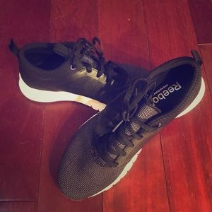 Black Reebok tennis shoes